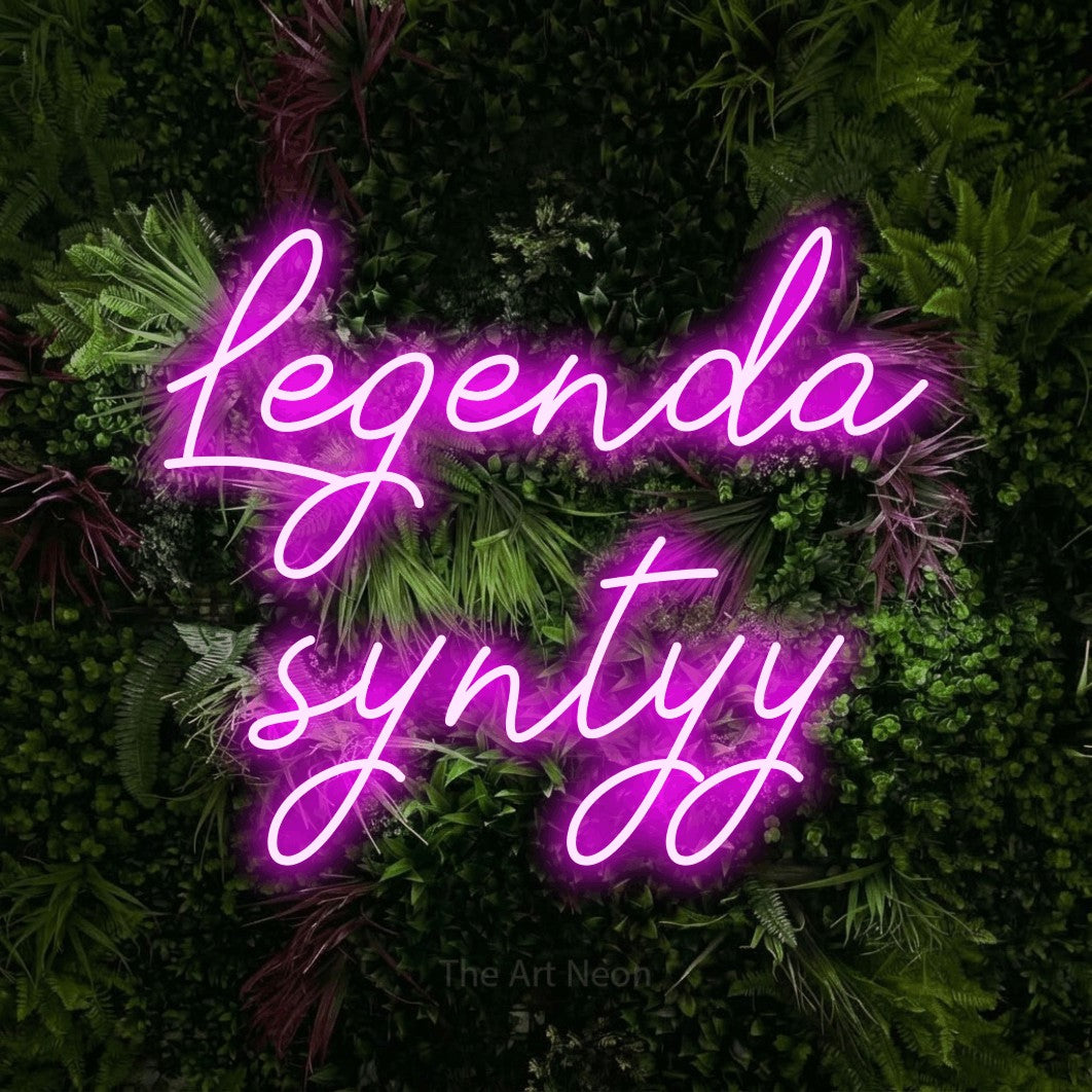 LED neon sign reading “Legenda syntyy”, arranged in 2 lines.