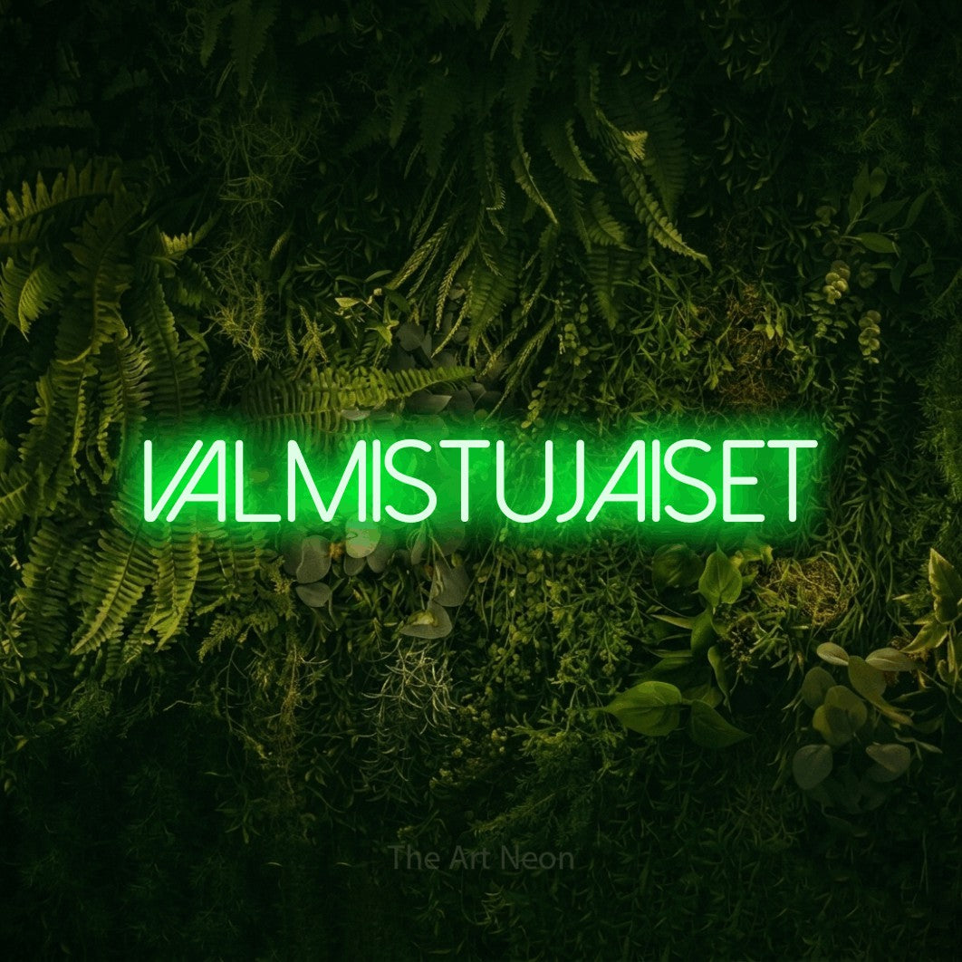 LED neon sign reading “Valmistujaiset”, arranged in a single line.