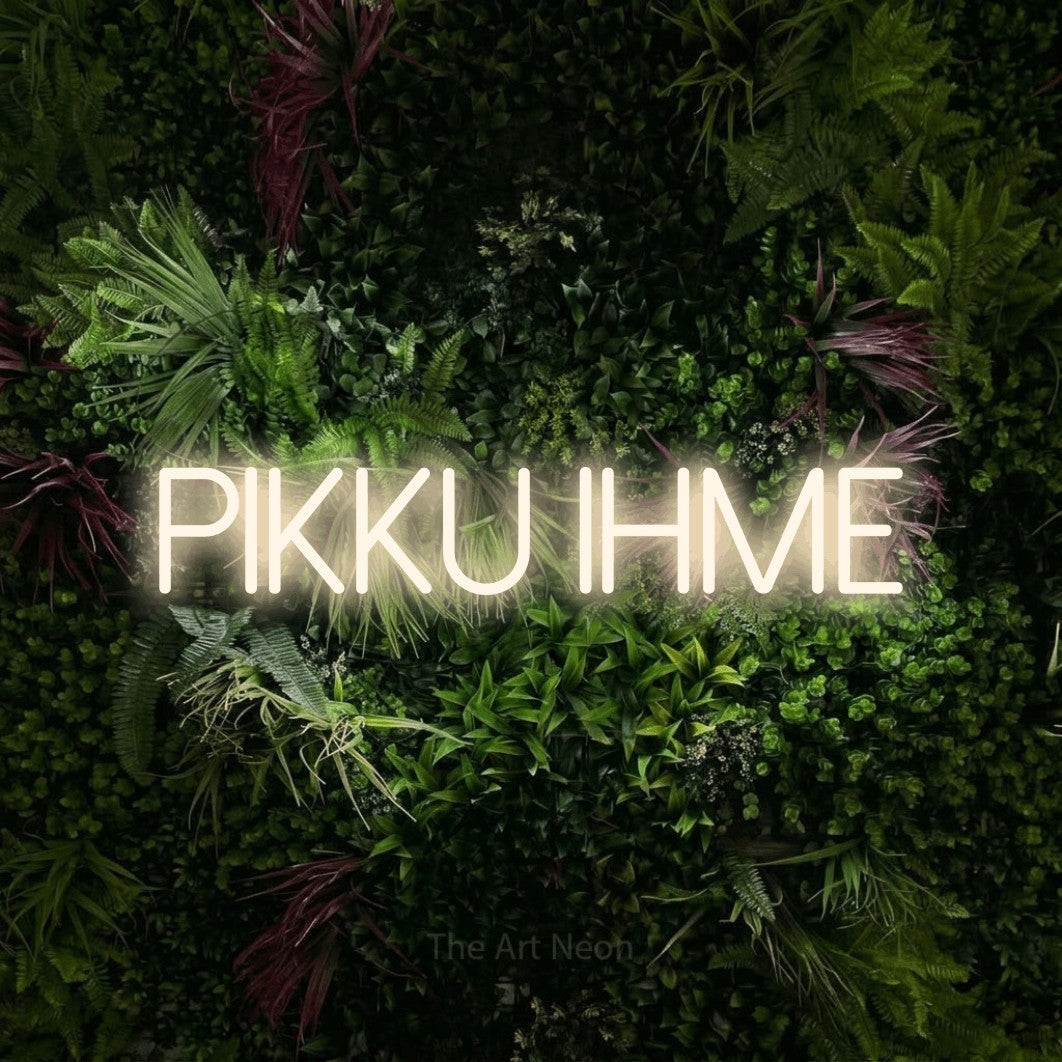 LED neon sign reading “Pikku ihme”, arranged in a single line.