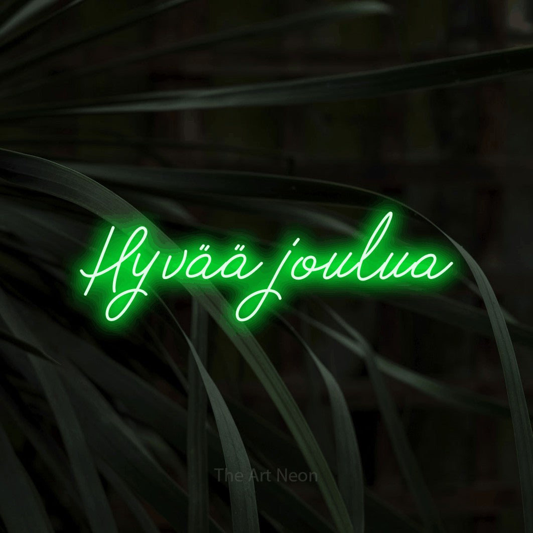 LED neon sign reading “Hyvää joulua”, arranged in a single line.