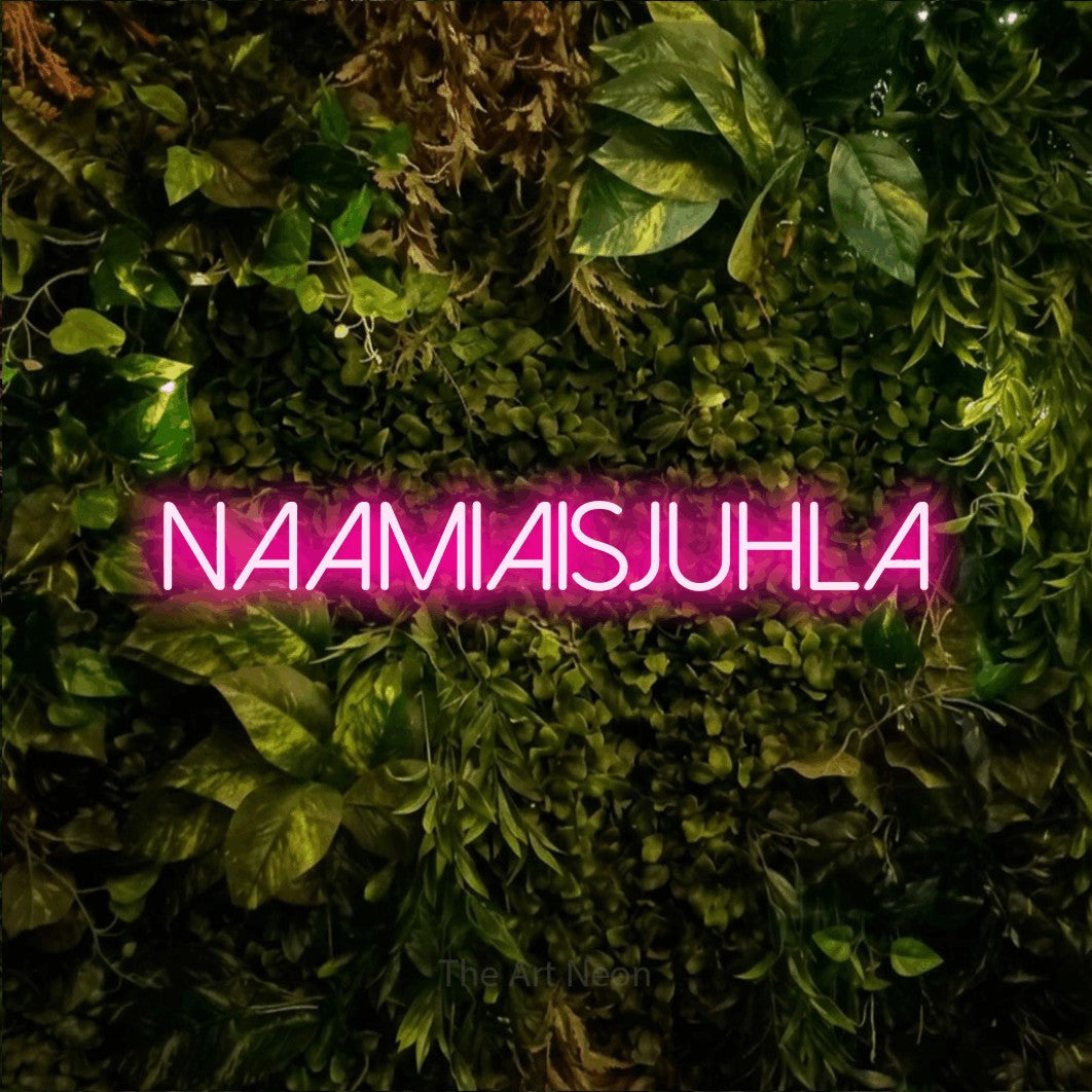 LED neon sign reading “Naamiaisjuhla”, arranged in a single line.
