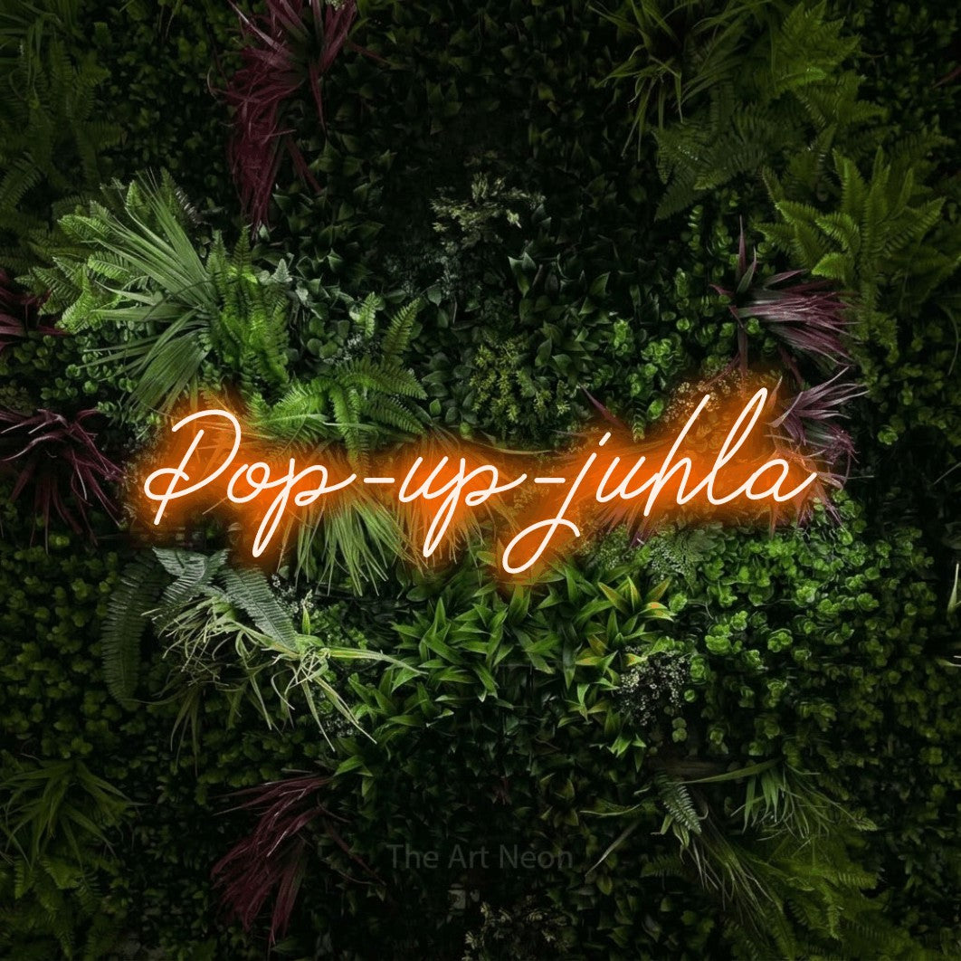 LED neon sign reading “Pop-up-juhla”, arranged in a single line.