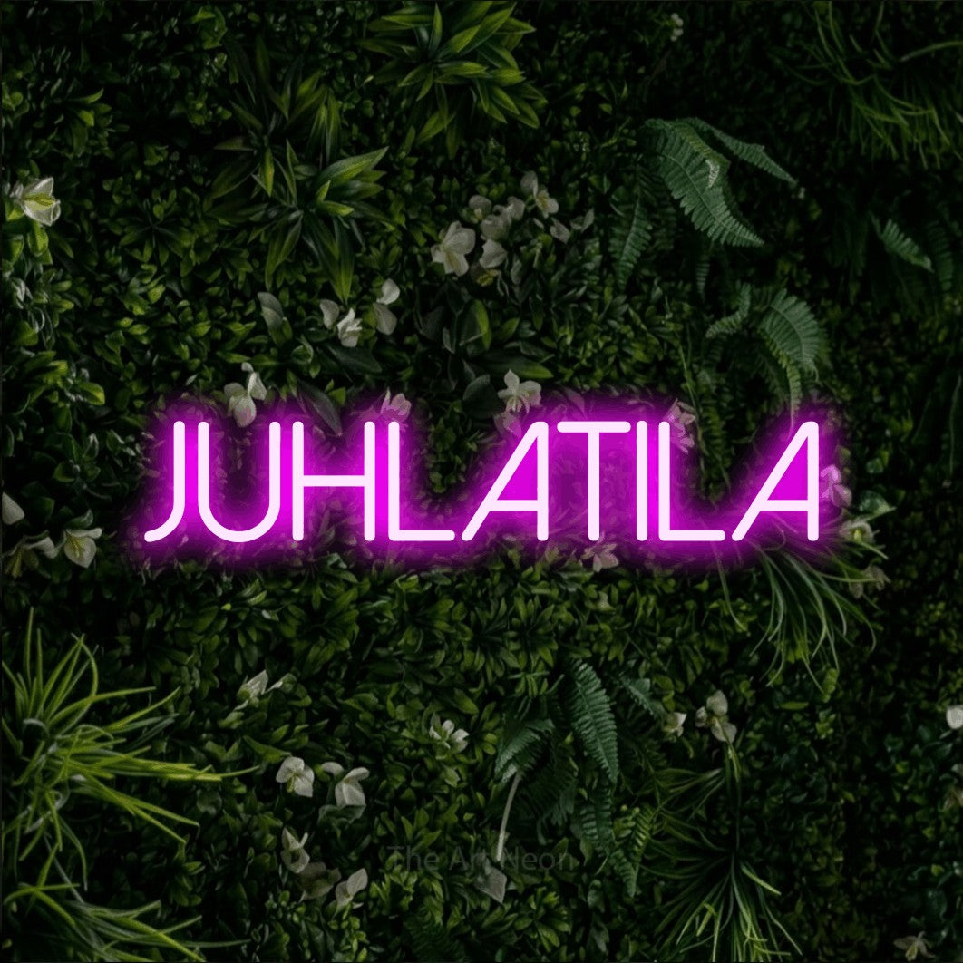 LED neon sign reading “JUHLATILA”, arranged in a single line.