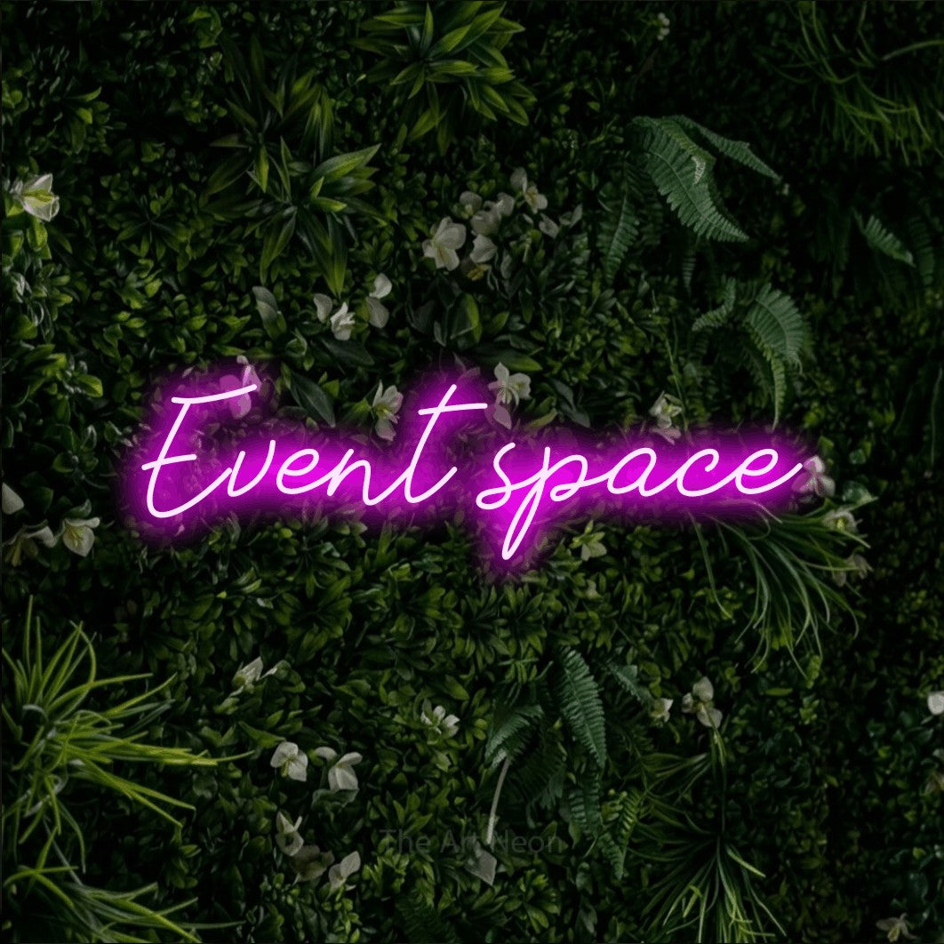 LED neon sign reading “Event space”, arranged in a single line.