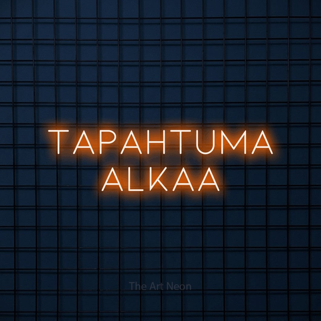 LED neon sign reading “Tapahtuma alkaa”, arranged in 2 lines.