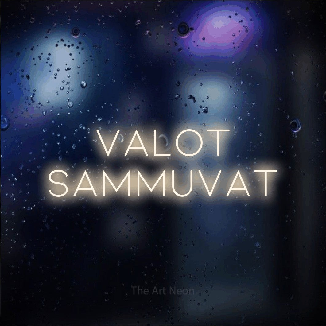 LED neon sign reading “valot SAMMUVAT”, arranged in 2 lines.