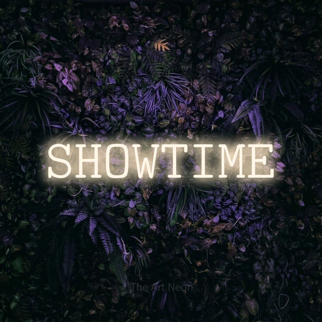 LED neon sign reading “SHOWTIME”, arranged in a single line.