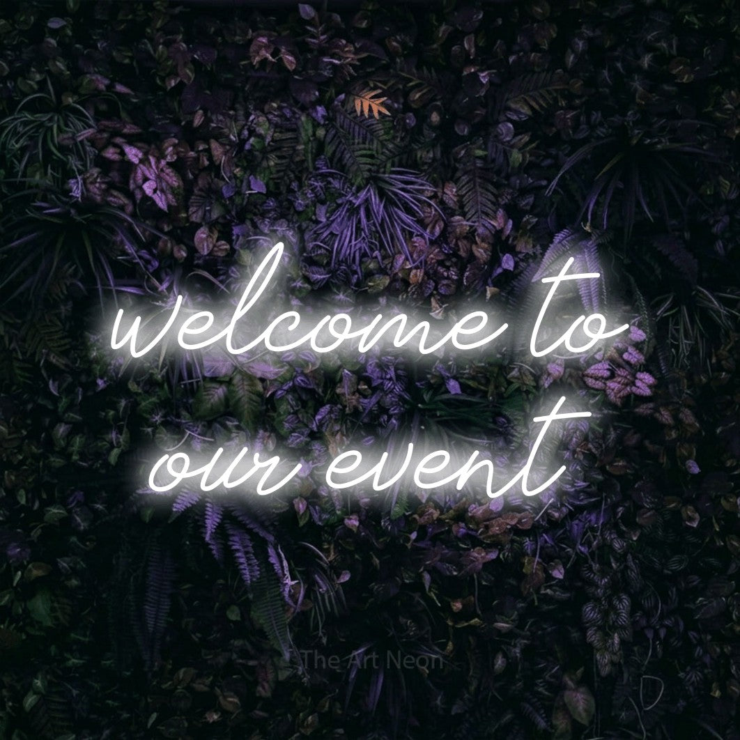 LED neon sign reading “welcome to our event”, arranged in 2 lines.