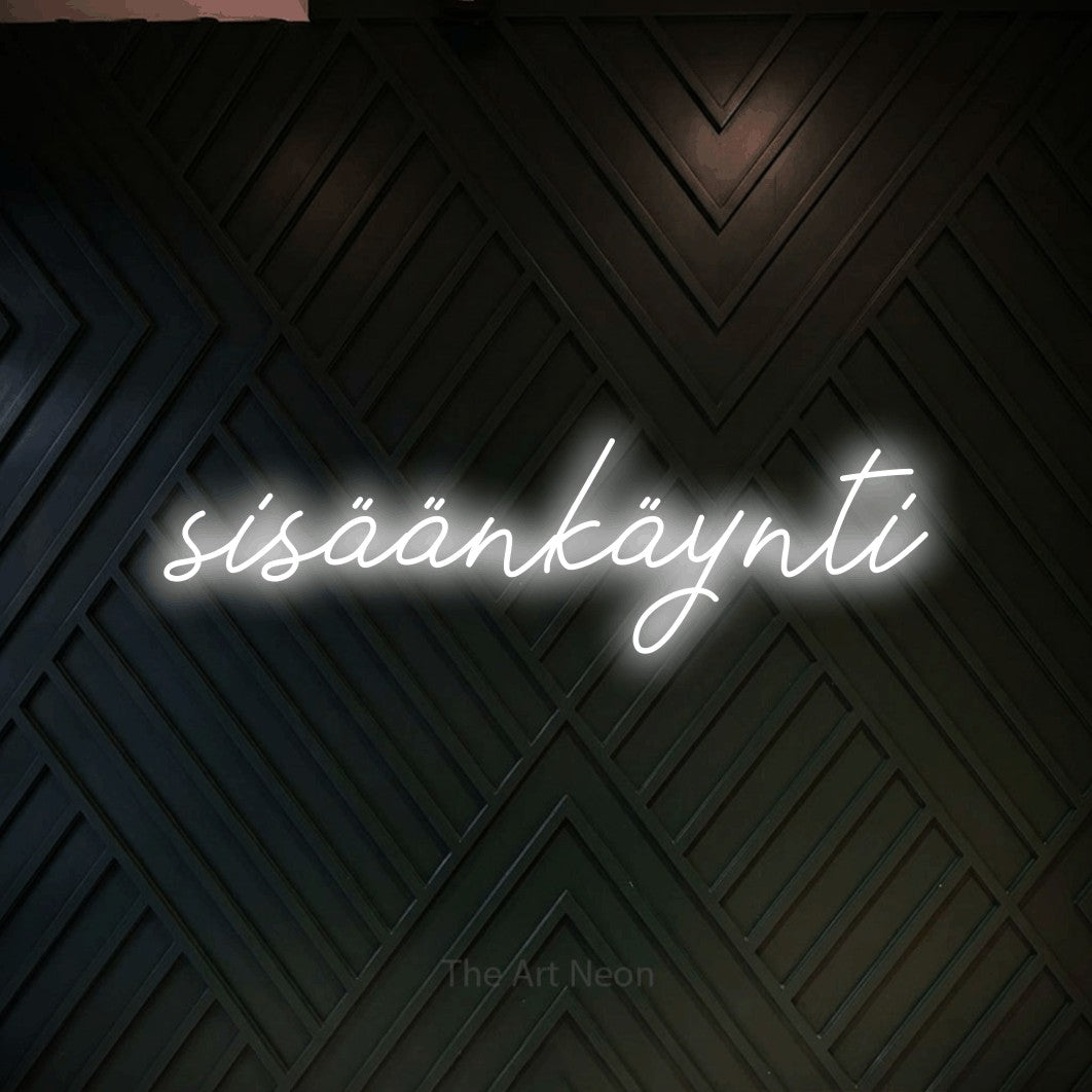 LED neon sign reading “sisäänkäynti”, arranged in a single line.