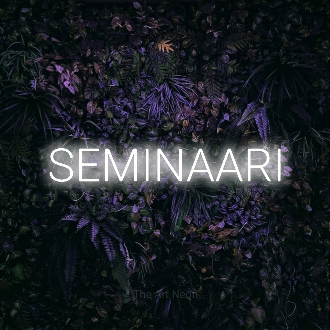 LED neon sign reading “SEMINAARI”, arranged in a single line.