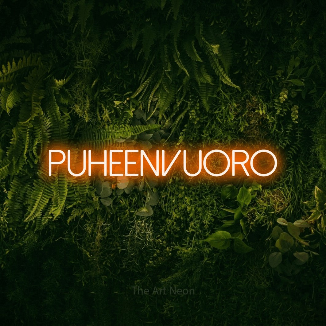 LED neon sign reading “PUHEENVUORO”, arranged in a single line.