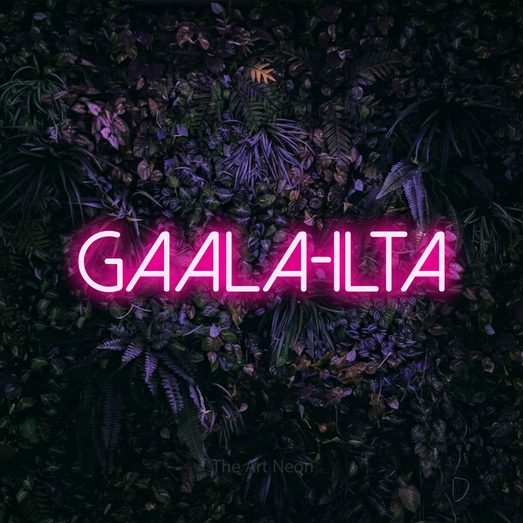 LED neon sign reading “GAALA-ILTA”, arranged in a single line.