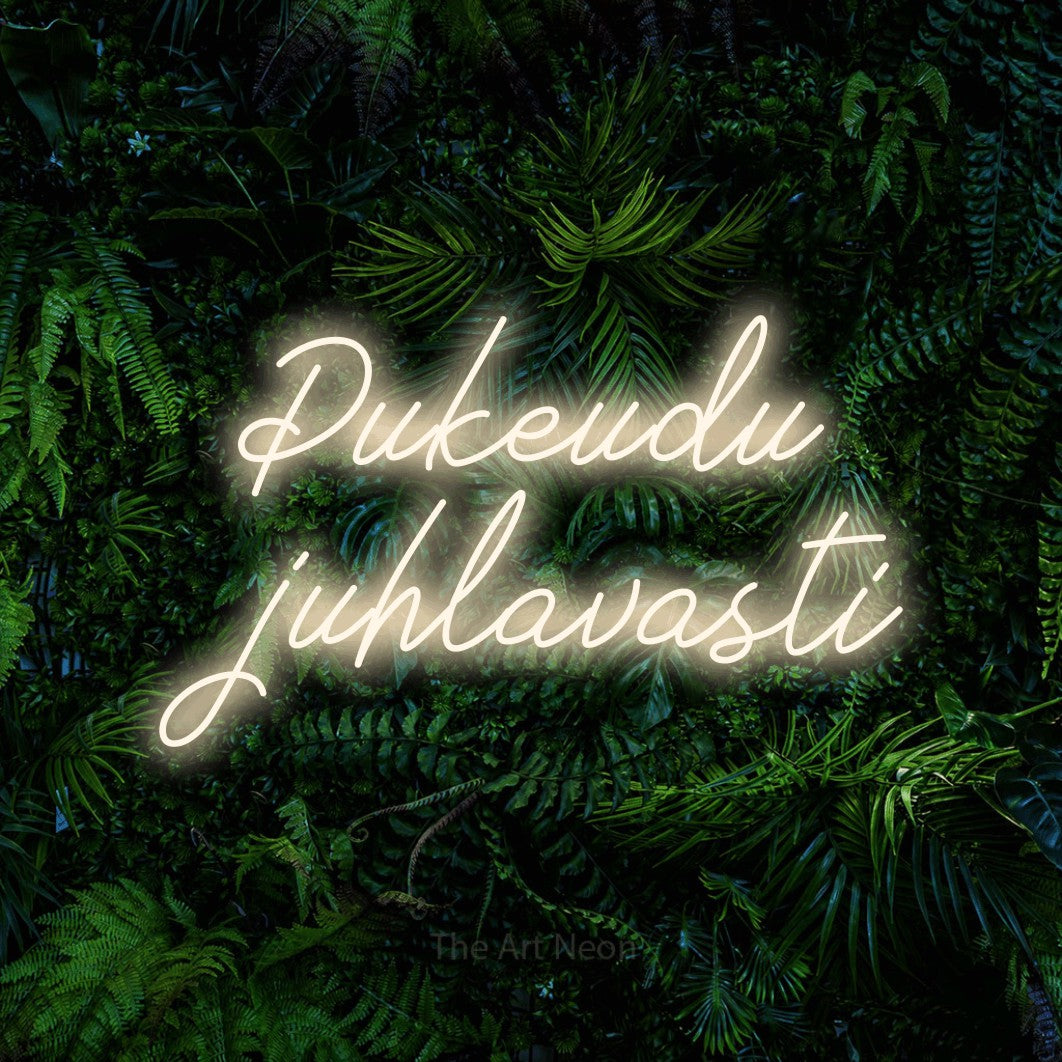 LED neon sign reading “Pukeudu juhlavasti”, arranged in 2 lines.