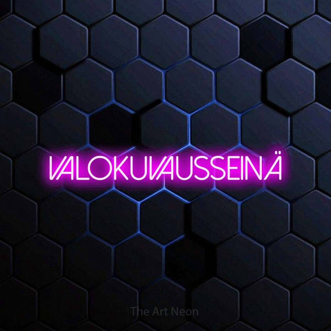 LED neon sign reading “Valokuvausseinä”, arranged in a single line.