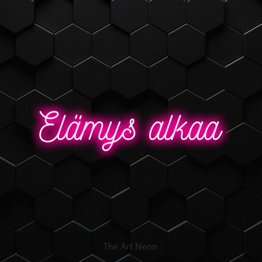 LED neon sign reading “Elämys alkaa”, arranged in a single line.