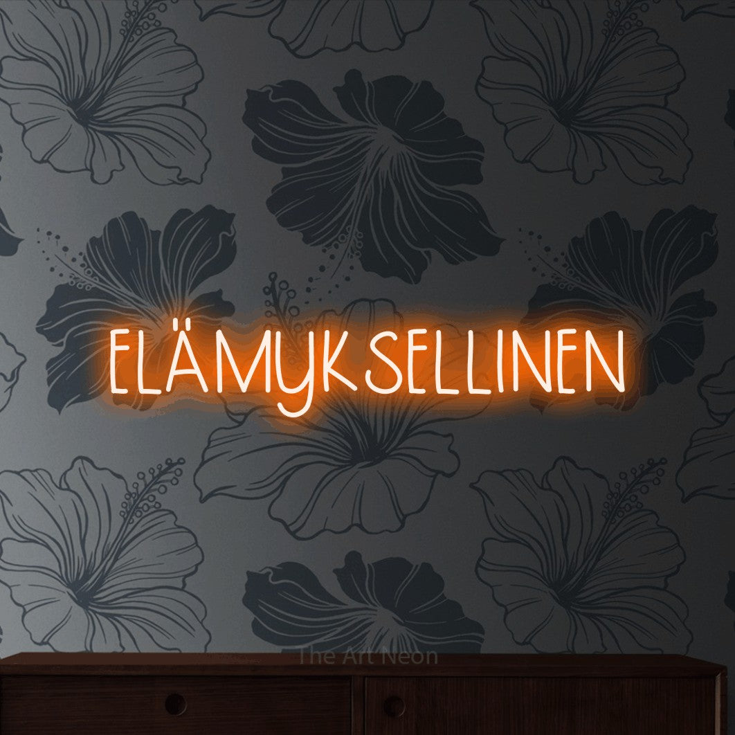 LED neon sign reading “ELÄMYKSELLINEN”, arranged in a single line.