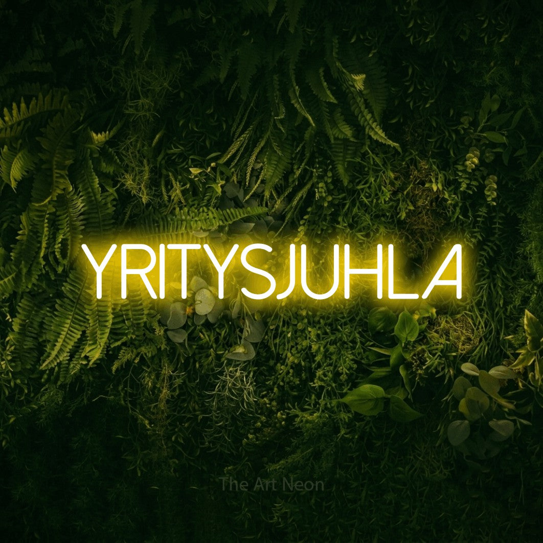 LED neon sign reading “YRITYSJUHLA”, arranged in a single line.