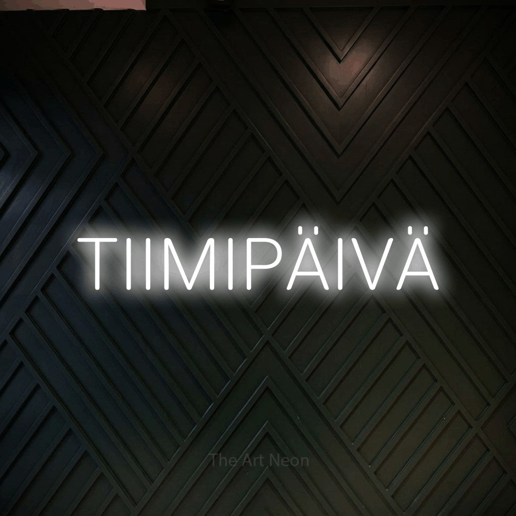 LED neon sign reading “TIIMIPÄIVÄ”, arranged in a single line.