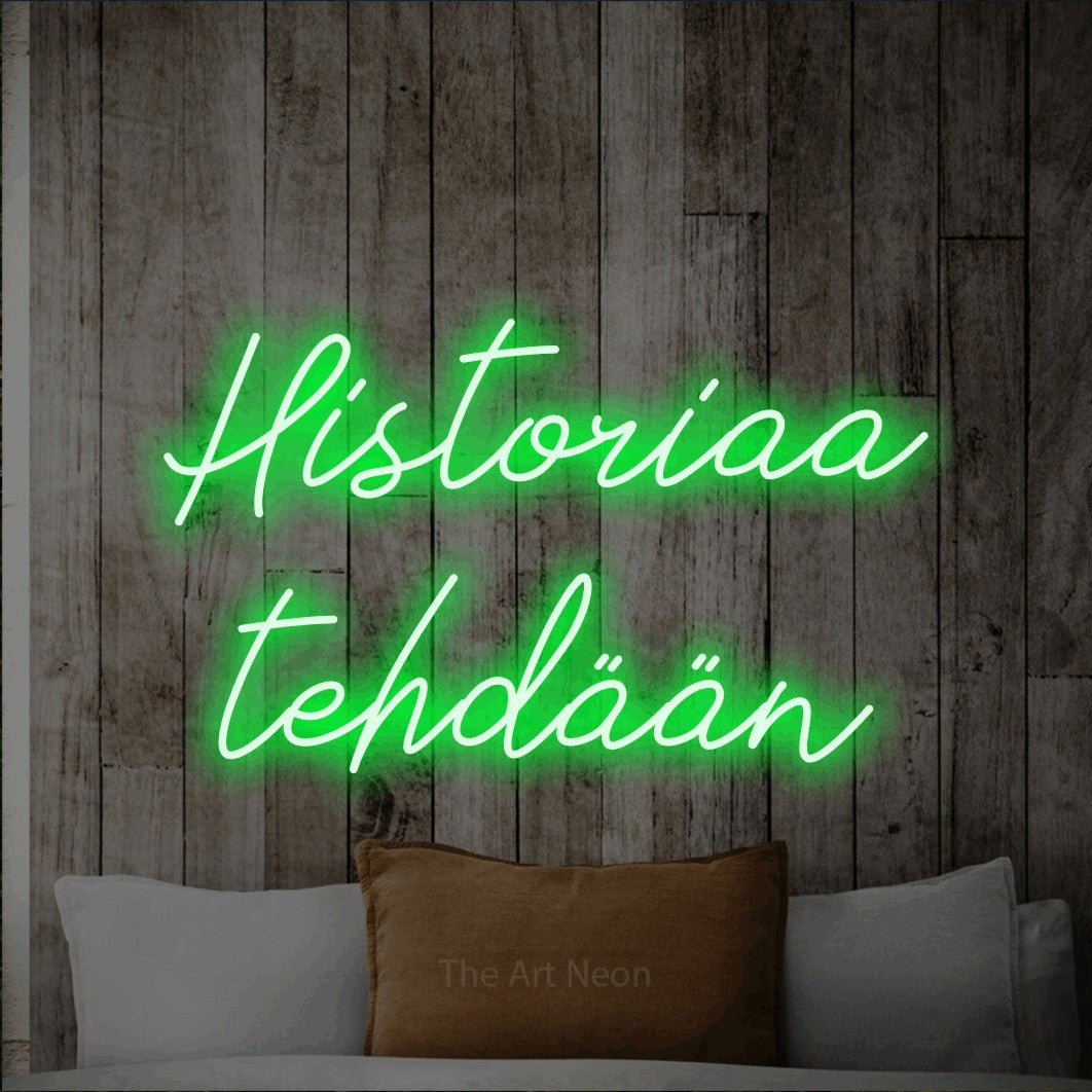 LED neon sign reading “Historiaa tehdään”, arranged in 2 lines.