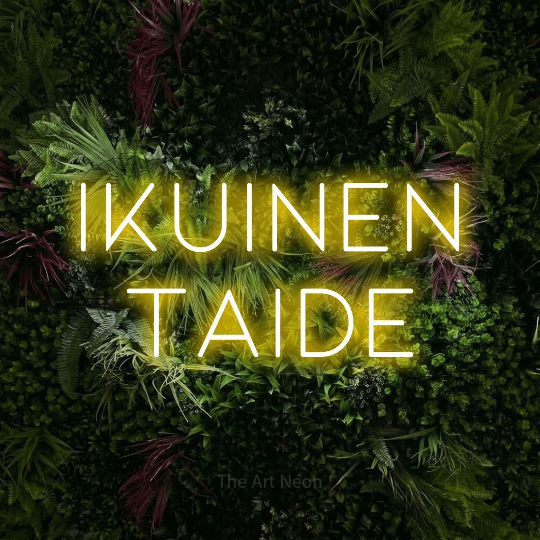LED neon sign reading “ikuinen taide”, arranged in 2 lines.