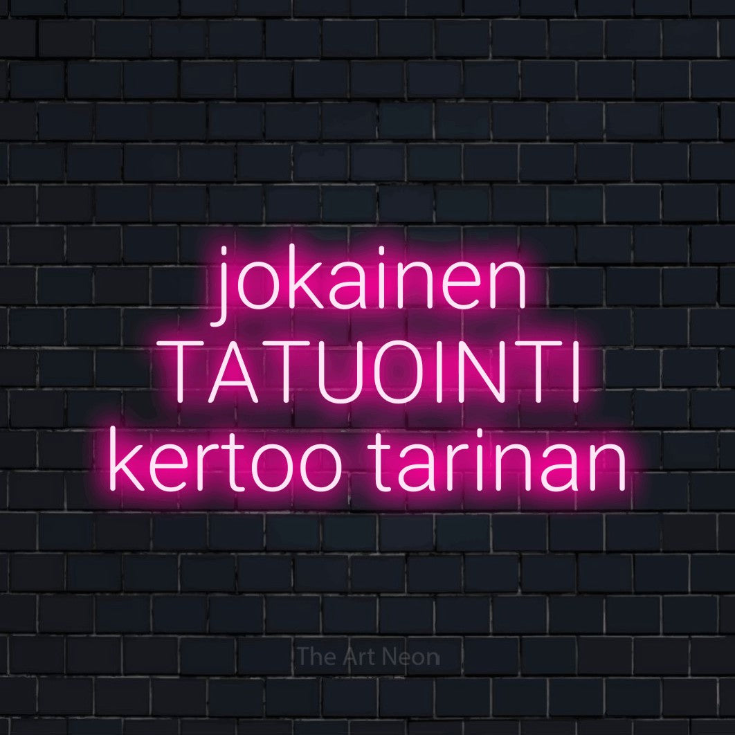 LED neon sign reading “jokainen TATUOINTI kertoo tarinan”, arranged in 3 lines.