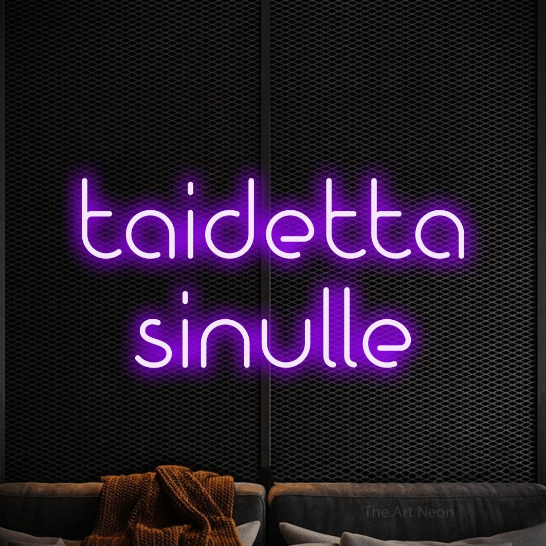LED neon sign reading “taidetta sinulle”, arranged in 2 lines.