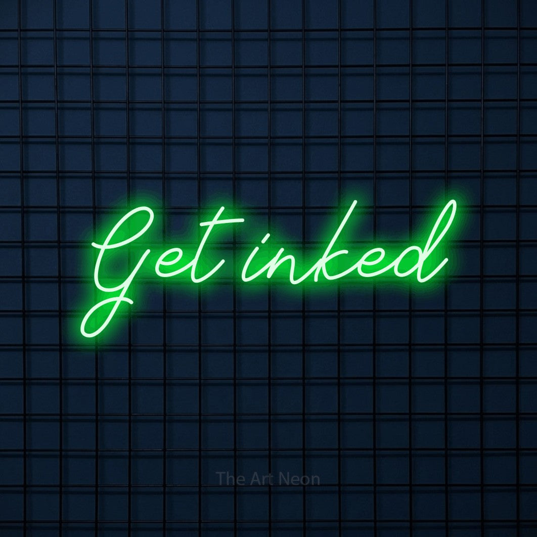LED neon sign reading “Get inked”, arranged in a single line.
