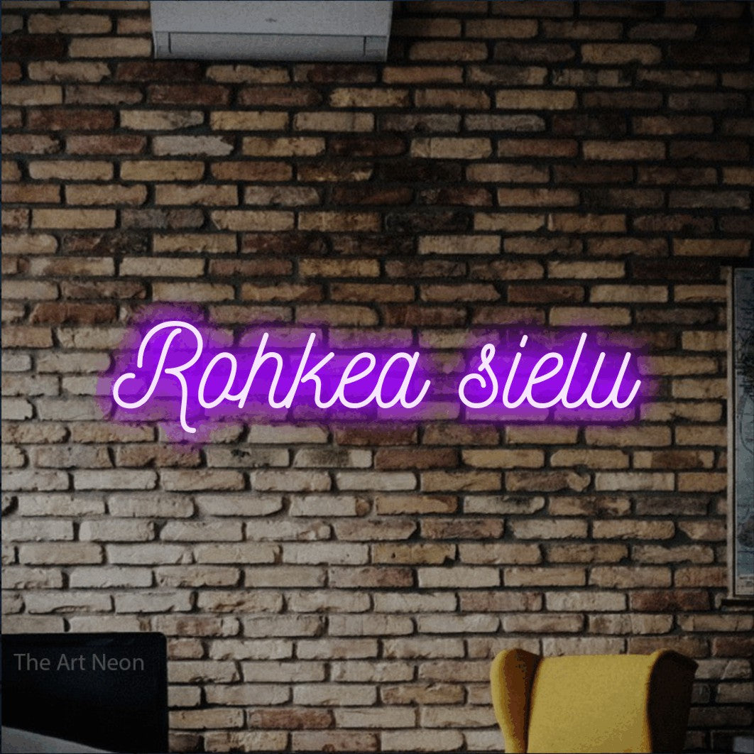 LED neon sign reading “Rohkea sielu”, arranged in a single line.