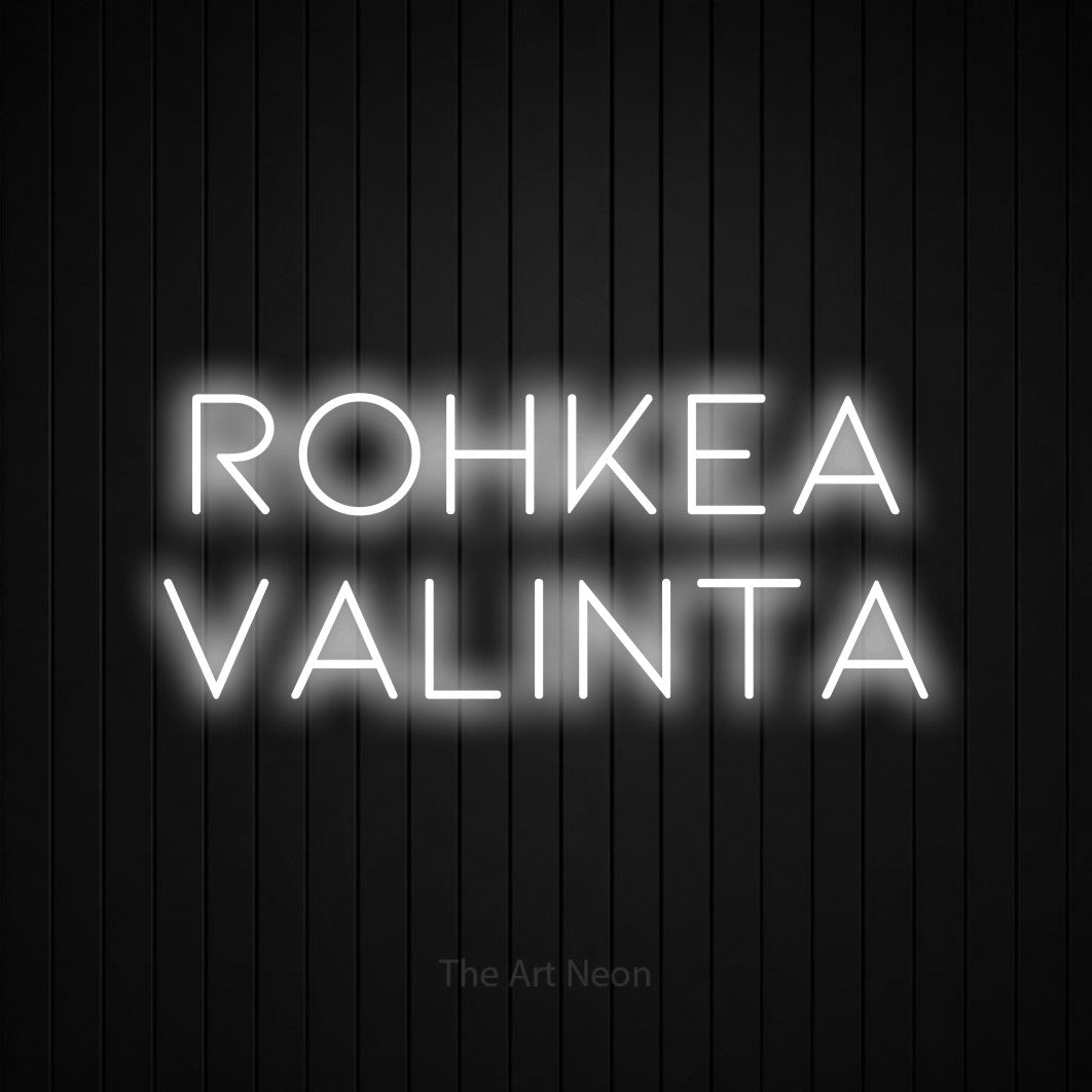 LED neon sign reading “rohkea VALINTA”, arranged in 2 lines.