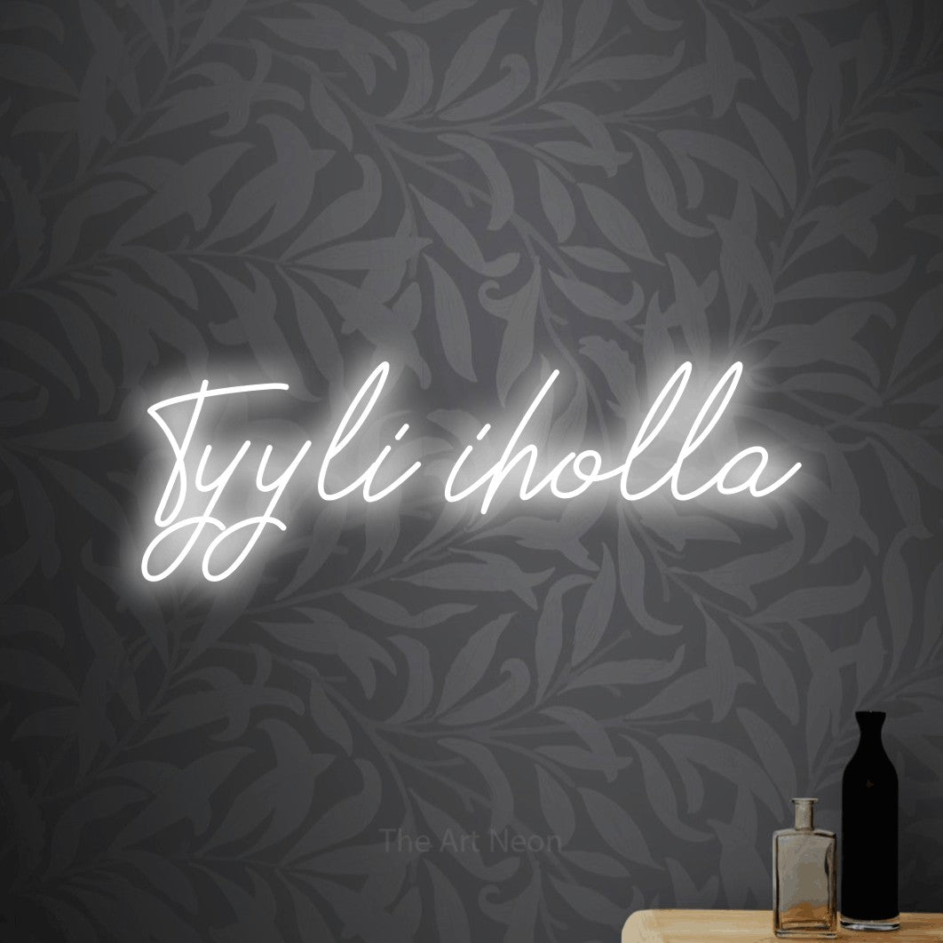 LED neon sign reading “Tyyli iholla”, arranged in a single line.