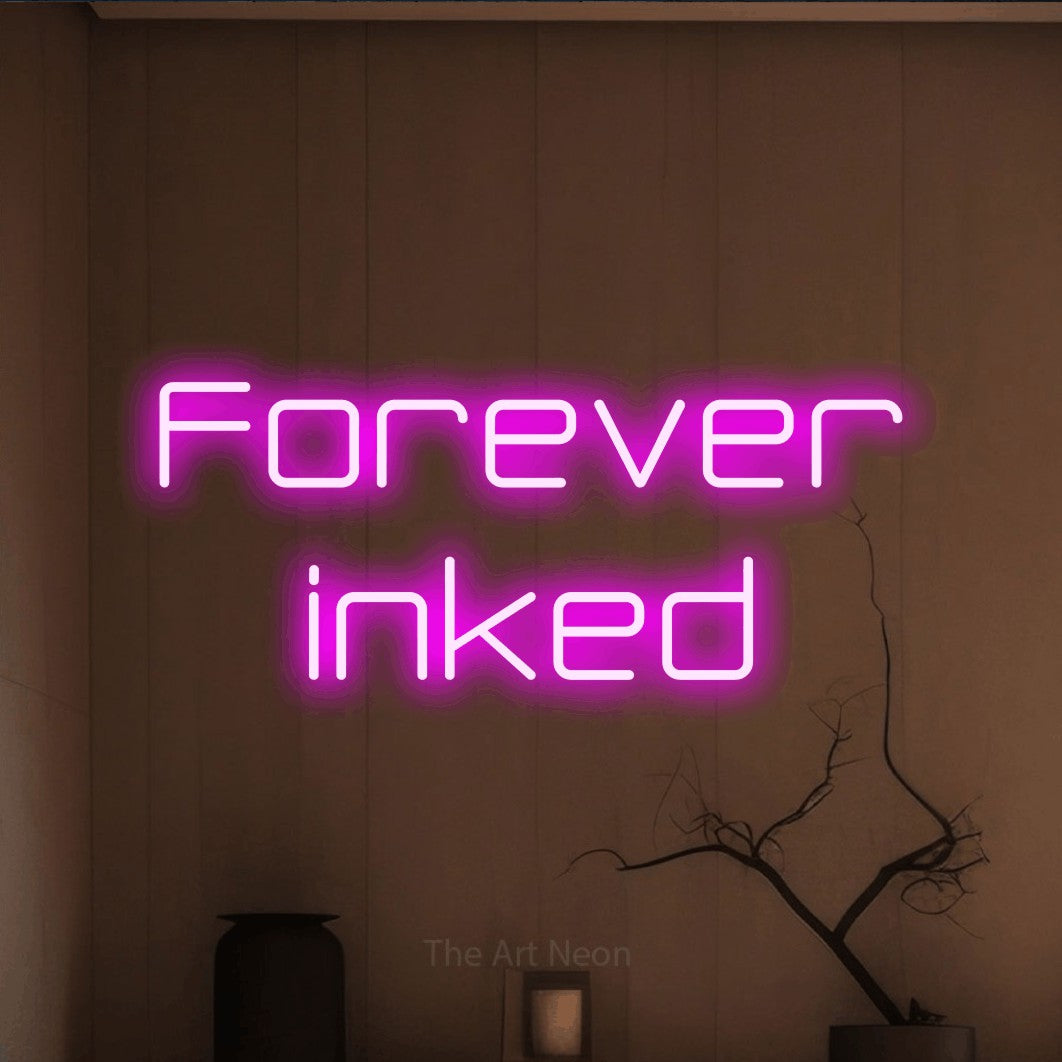 LED neon sign reading “Forever inked”, arranged in 2 lines.