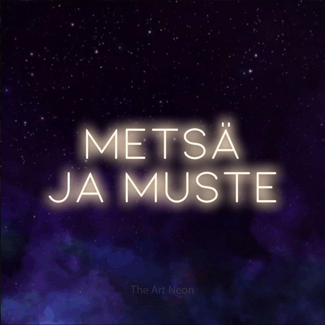 LED neon sign reading “metsä ja muste”, arranged in 2 lines.