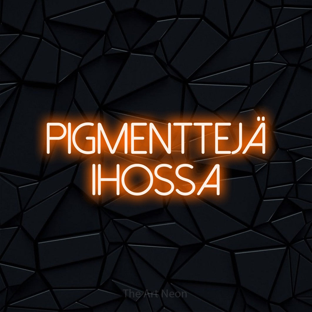 LED neon sign reading “PIGMENTTEJÄ ihossa”, arranged in 2 lines.