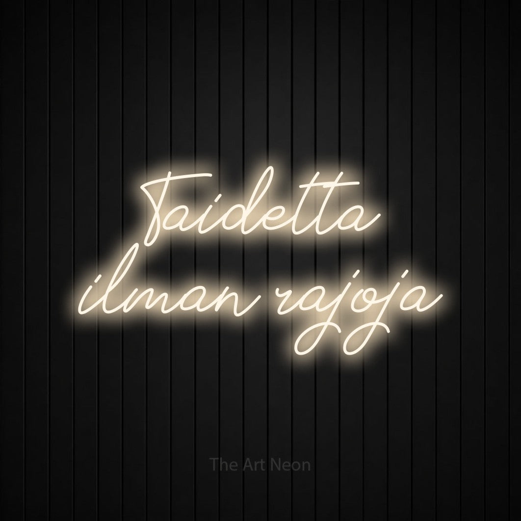 LED neon sign reading “Taidetta ilman rajoja”, arranged in 2 lines.