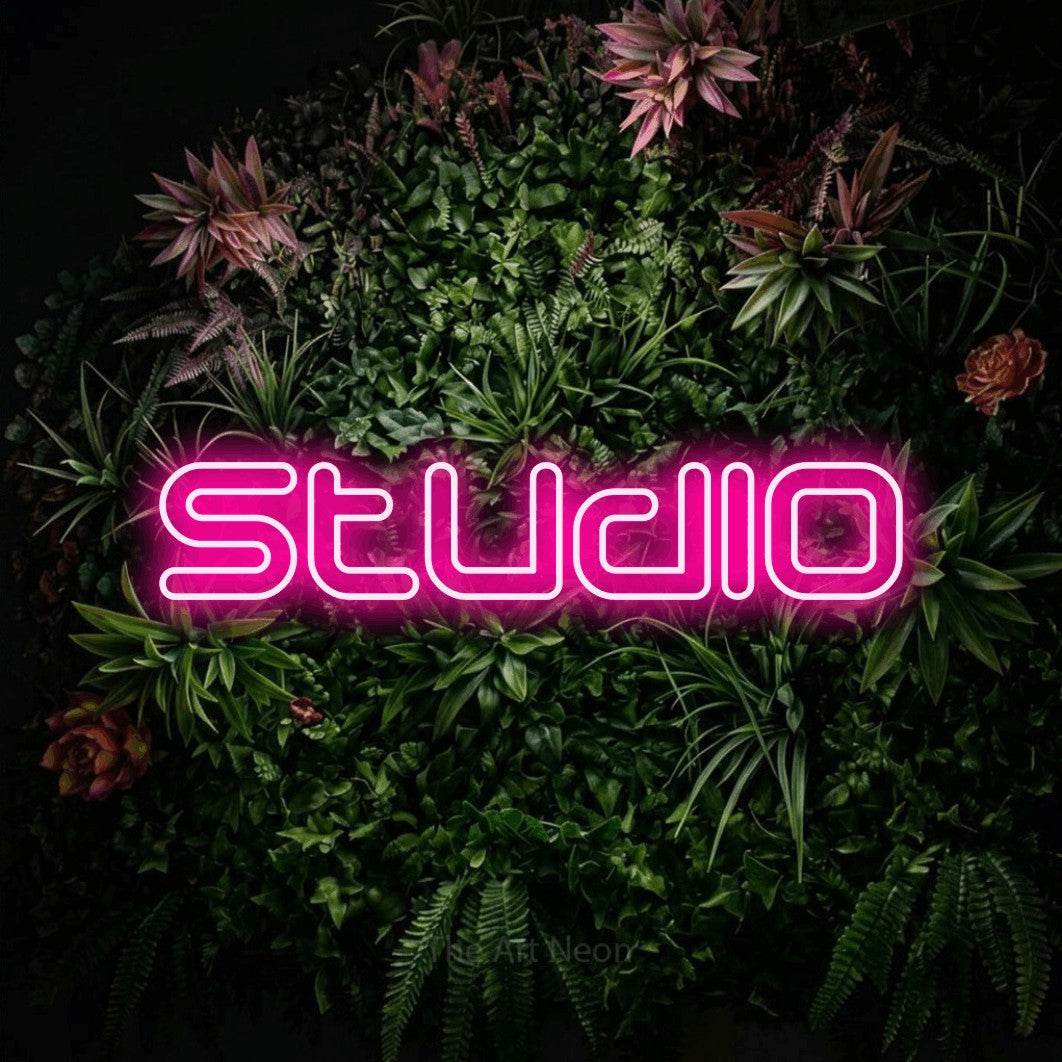 LED neon sign reading “Studio”, arranged in a single line.