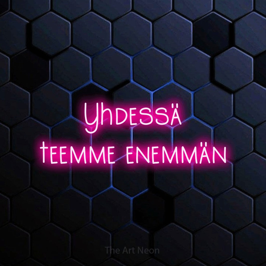 LED neon sign reading “Yhdessä teemme enemmän”, arranged in 2 lines.