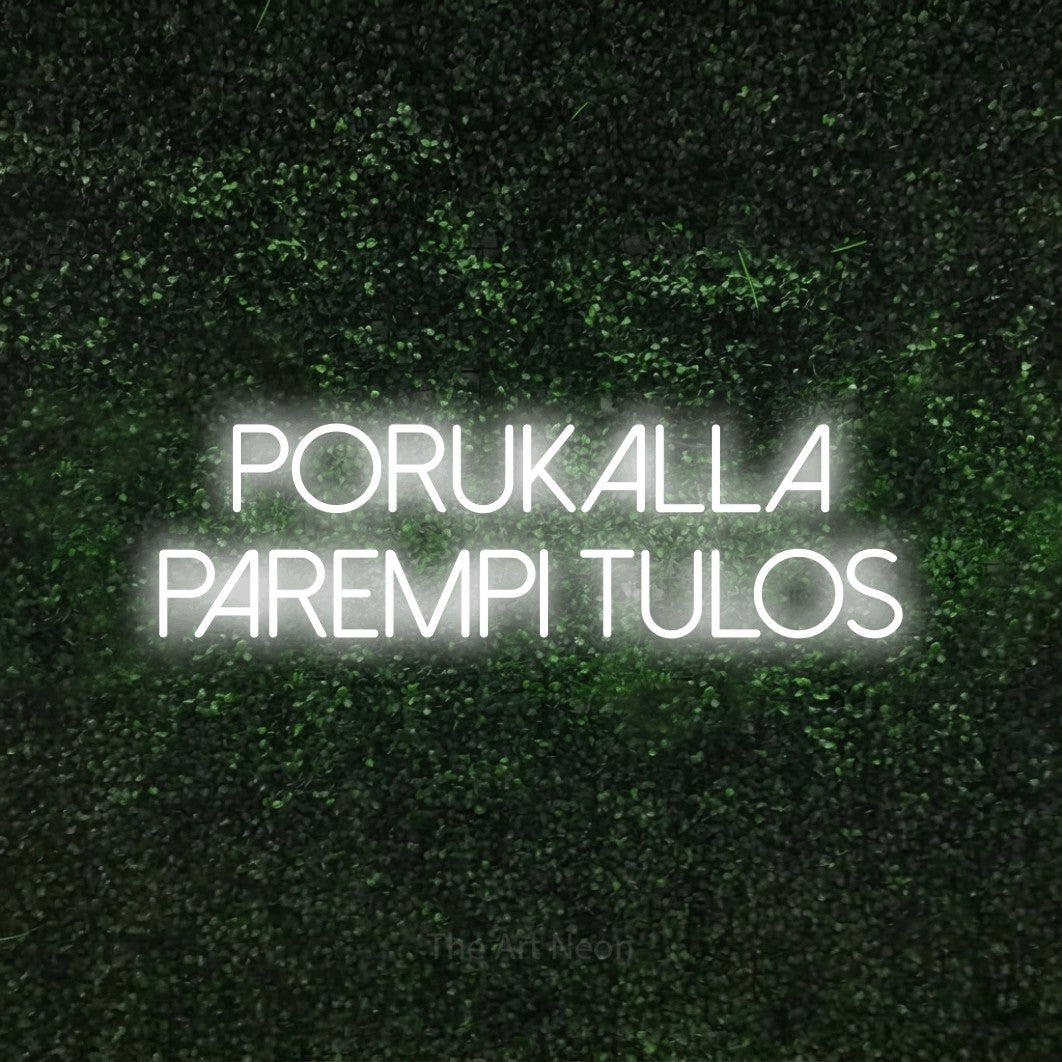 LED neon sign reading “Porukalla parempi tulos”, arranged in 2 lines.