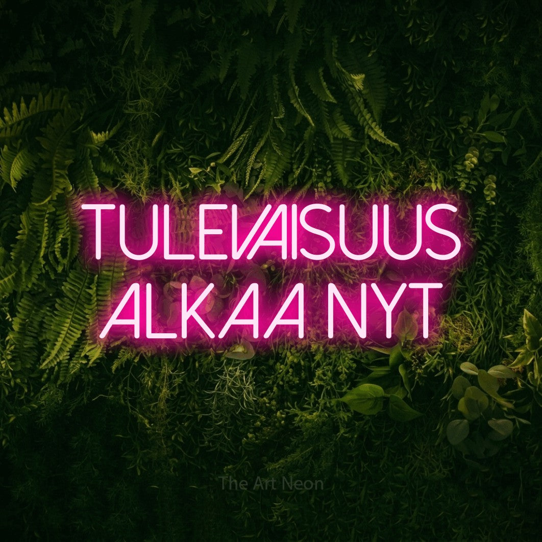 LED neon sign reading “Tulevaisuus alkaa nyt”, arranged in 2 lines.