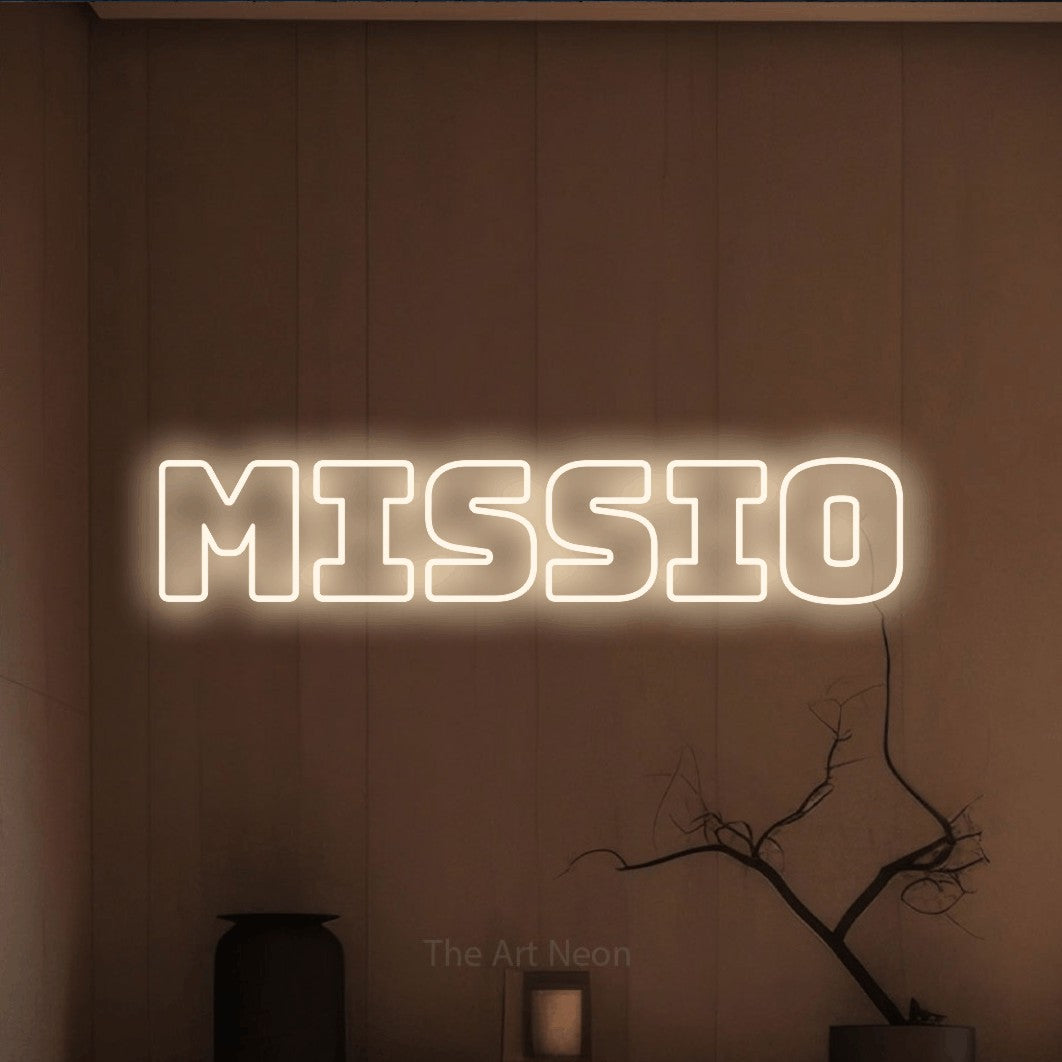 LED neon sign reading “Missio”, arranged in a single line.