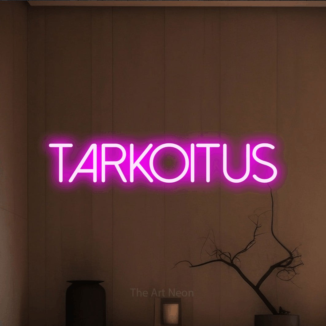 LED neon sign reading “TARKOITUS”, arranged in a single line.