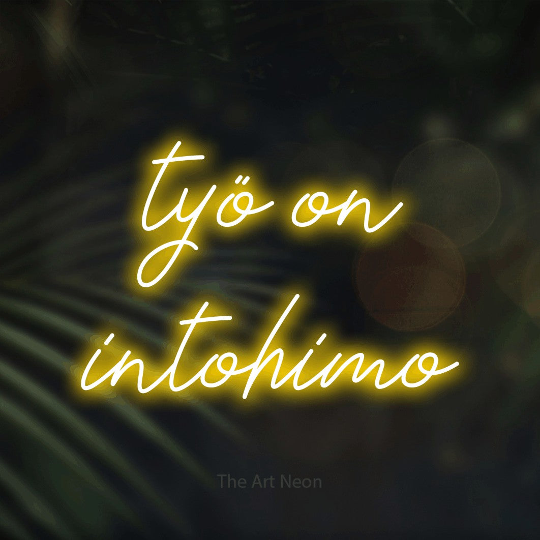 LED neon sign reading “työ on intohimo”, arranged in 2 lines.
