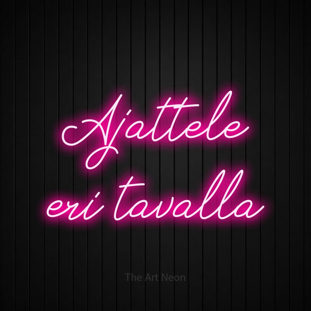 LED neon sign reading “Ajattele eri tavalla”, arranged in 2 lines.