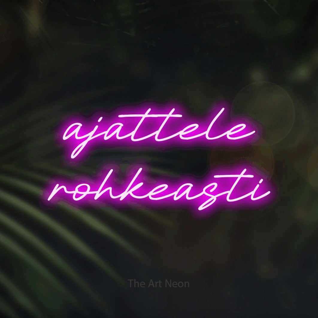LED neon sign reading “ajattele rohkeasti”, arranged in 2 lines.