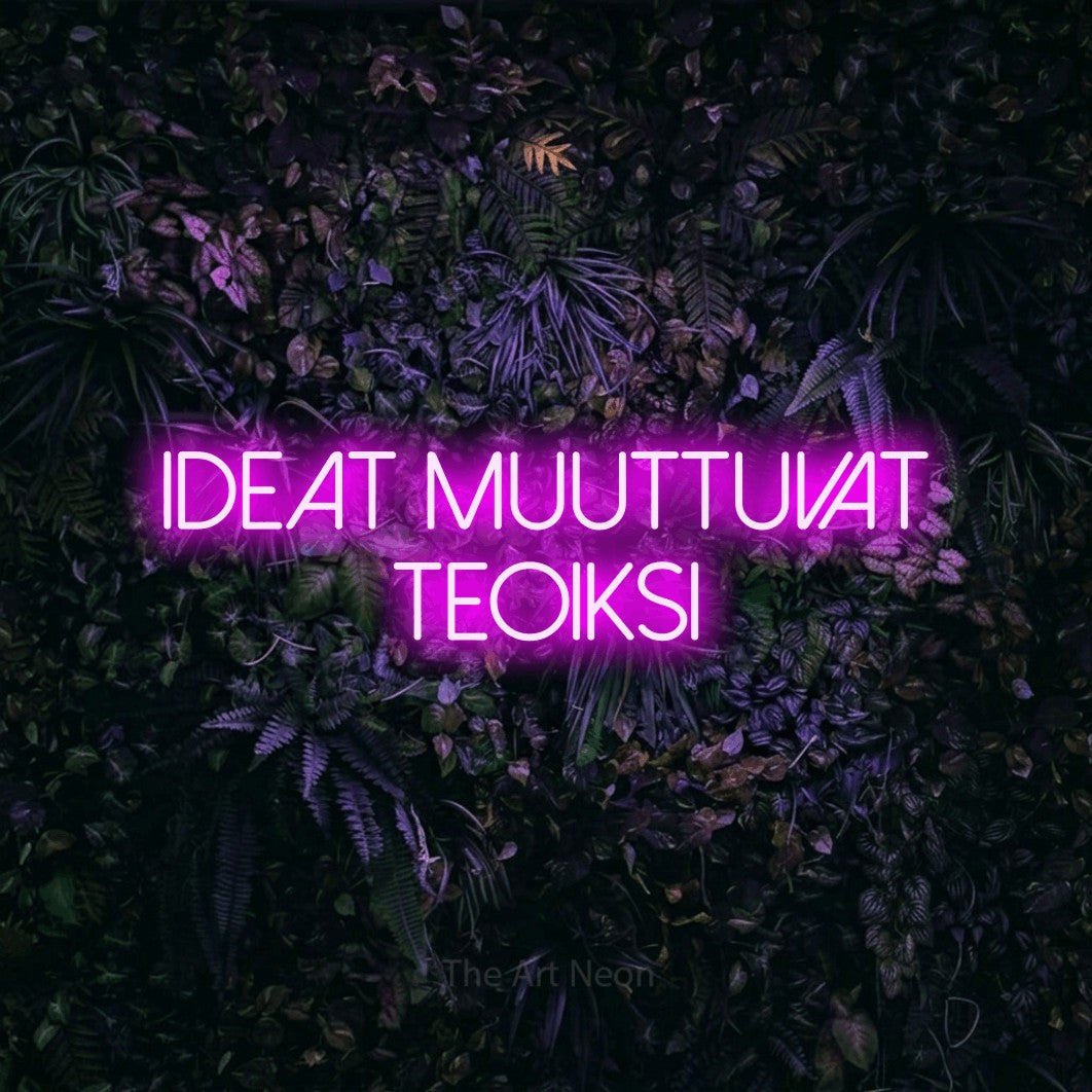 LED neon sign reading “Ideat muuttuvat teoiksi”, arranged in 2 lines.