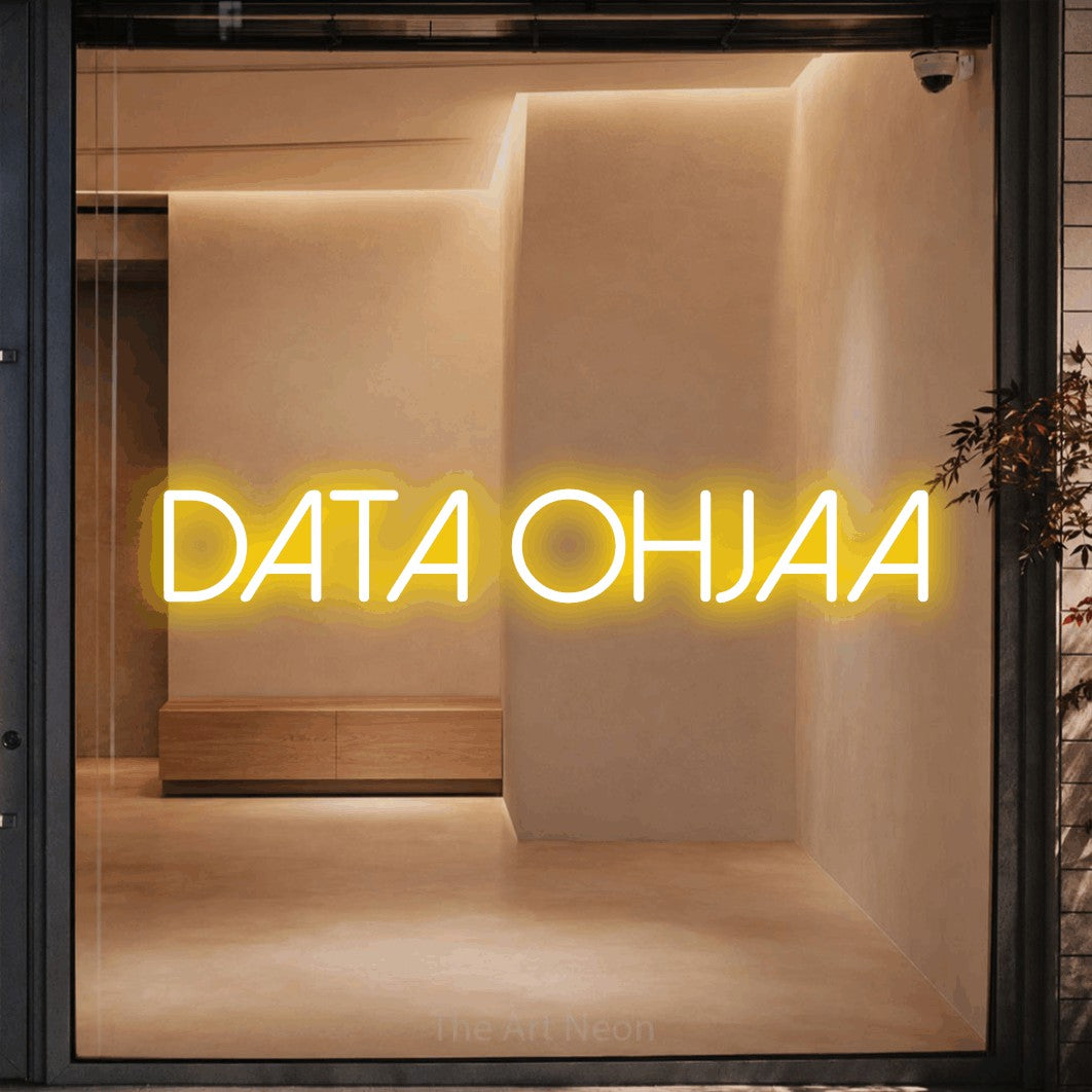 LED neon sign reading “Data ohjaa”, arranged in a single line.
