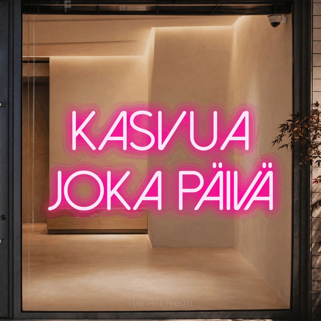 LED neon sign reading “Kasvua joka päivä”, arranged in 2 lines.