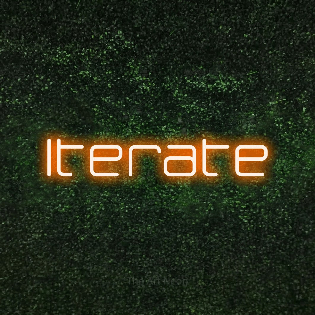 LED neon sign reading “Iterate”, arranged in a single line.