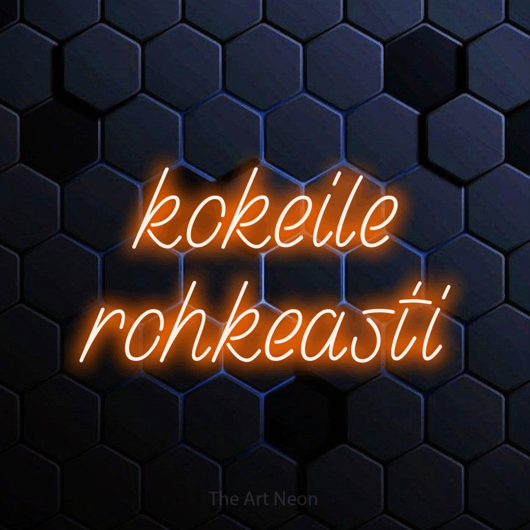 LED neon sign reading “kokeile rohkeasti”, arranged in 2 lines.