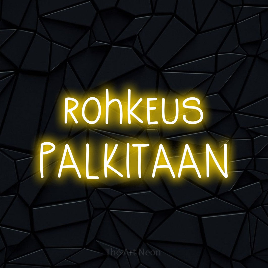 LED neon sign reading “rohkeus PALKITAAN”, arranged in 2 lines.