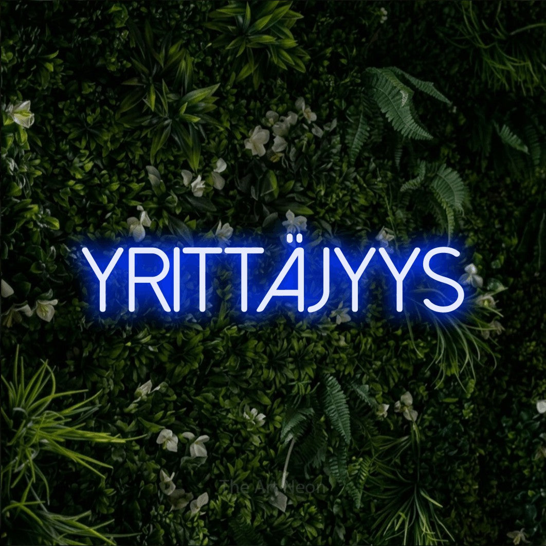 LED neon sign reading “Yrittäjyys”, arranged in a single line.